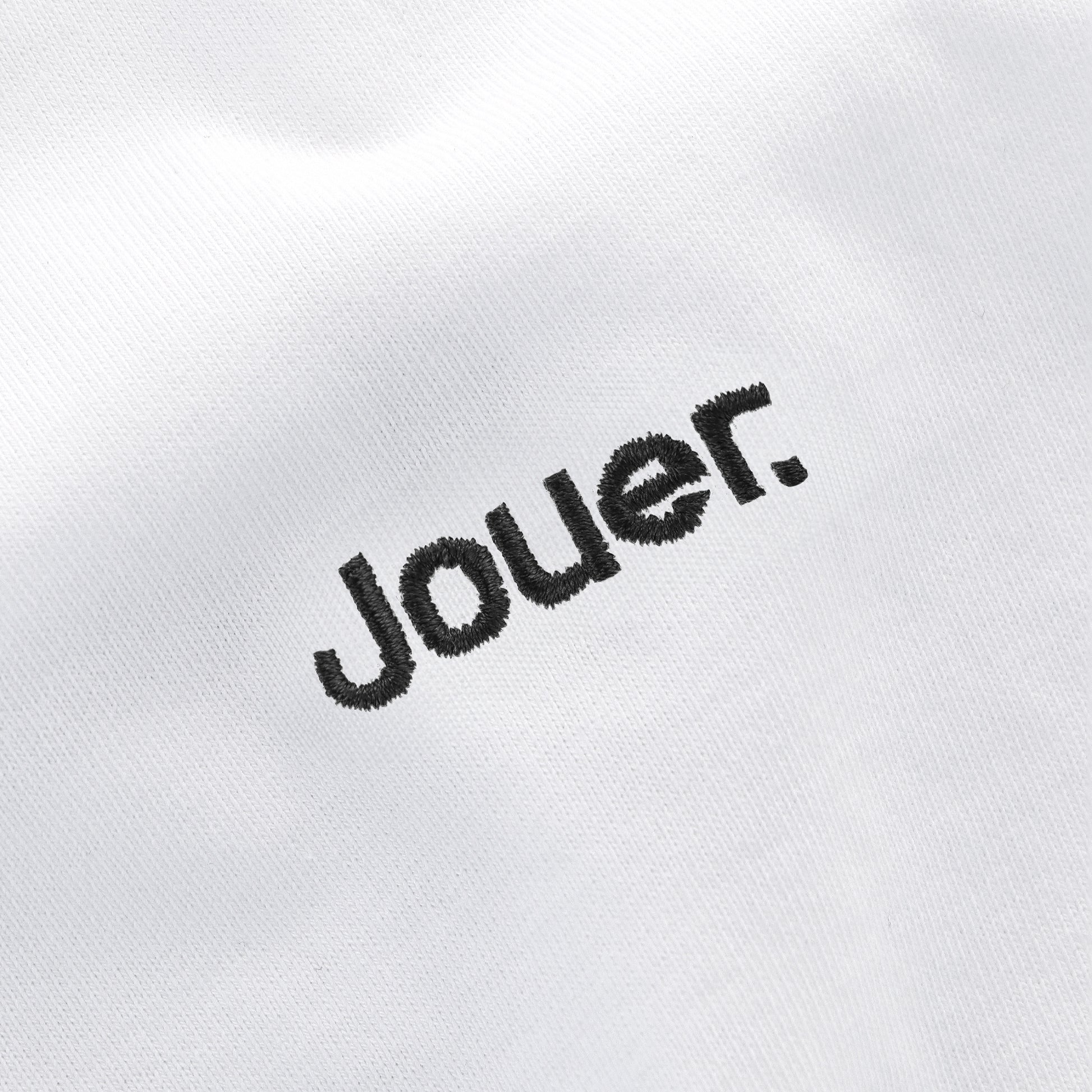 White 'Jouer' fundamental T-shirt with black embroidered logo on the front and large back print.