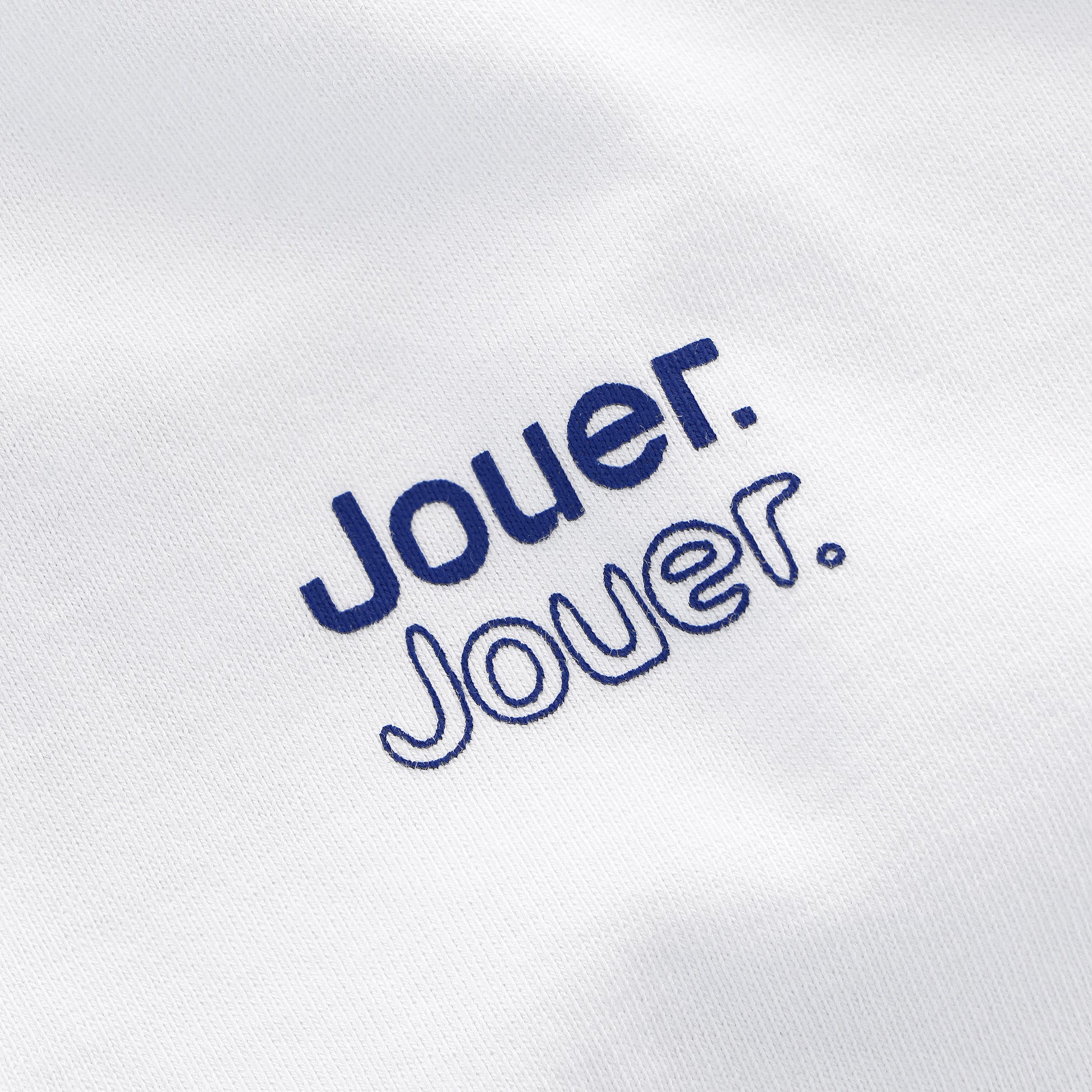 White 'Jouer' Olympic tribute T-shirt with unique back print design celebrating sports.